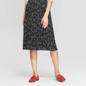 Midi Pleated Face Print Skirt